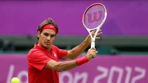 a picture of Roger Federer hitting a backhand volley